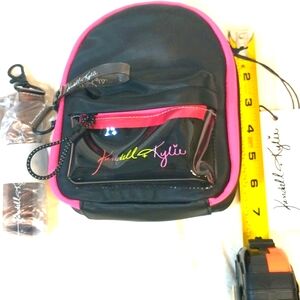 NWT Kendall + Kylie crossbody black, hot pink w/ rainbow script.